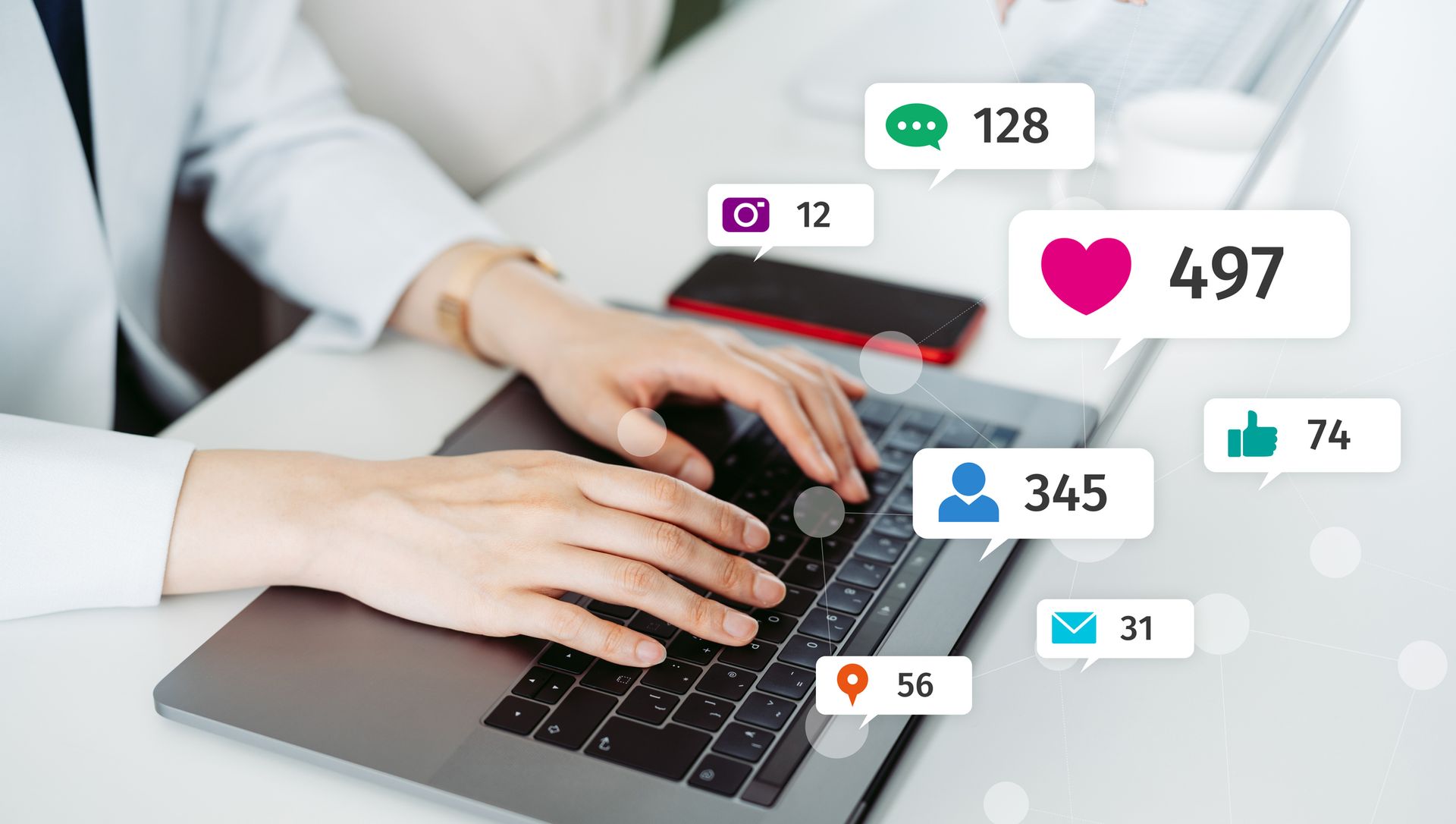 A Woman Is Typing on a Laptop Computer at a Desk — Kansas City, MO — SD Smith Business Resource Consulting Firm