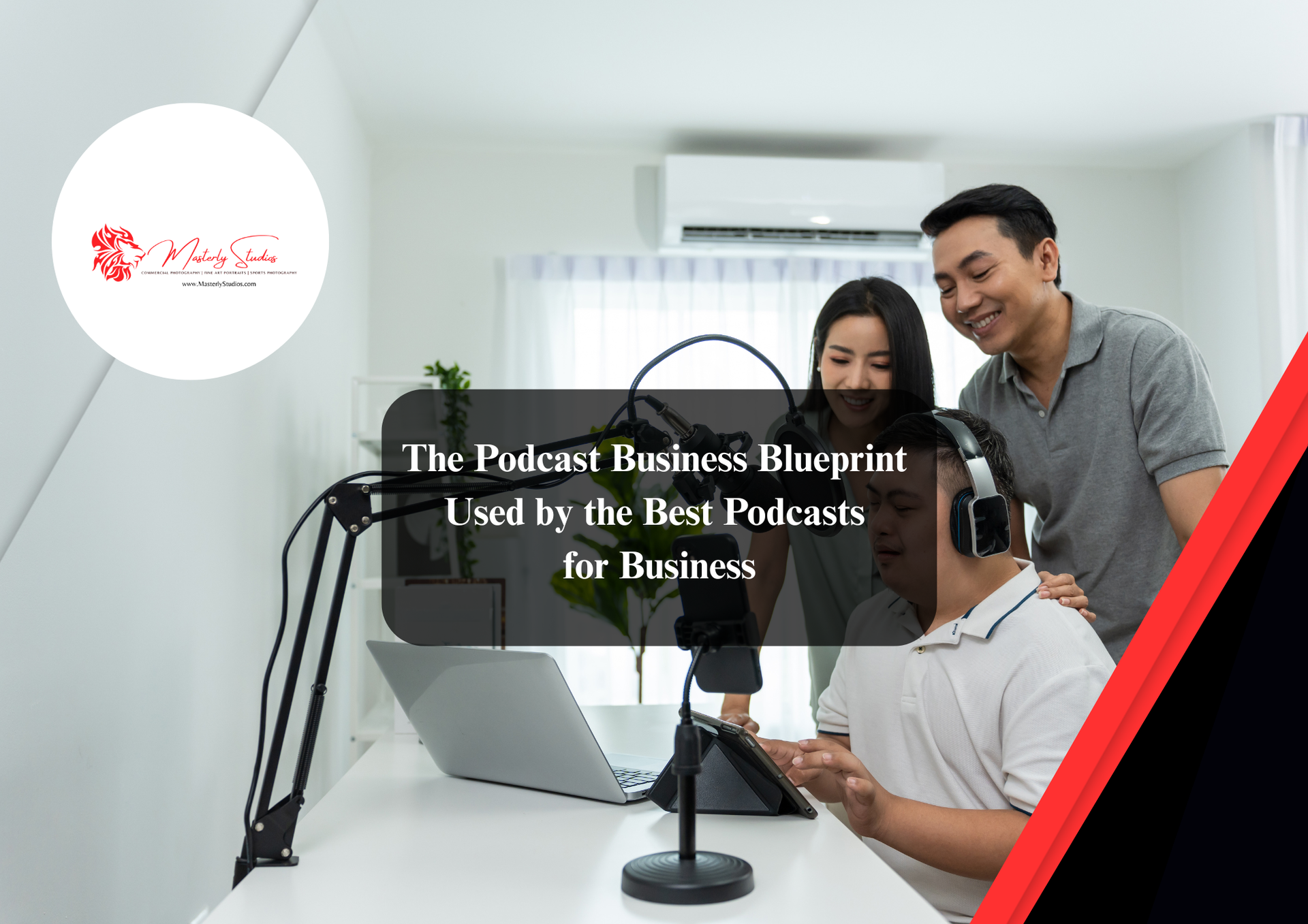 Two people in a studio setting, one wearing headphones, sitting at a desk with a laptop, microphone, and tablet.