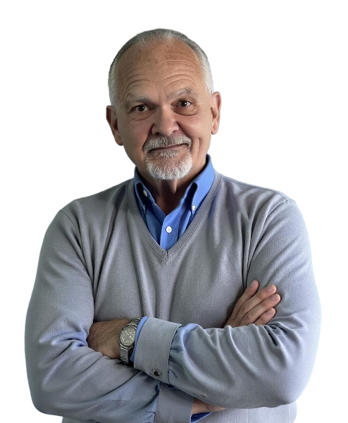 A man with his arms crossed and a watch on his wrist