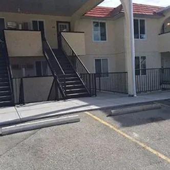 There are stairs leading up to the second floor of a building.
