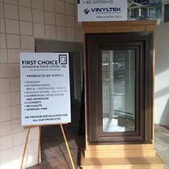 A sign that says first choice window and door center on it