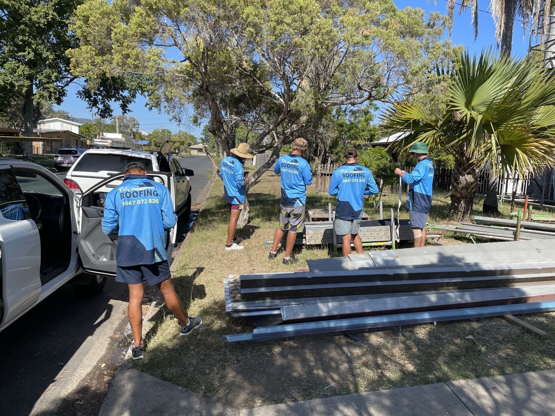 Roofers Installing Roof — Roofing Services in Airlie Beach, QLD