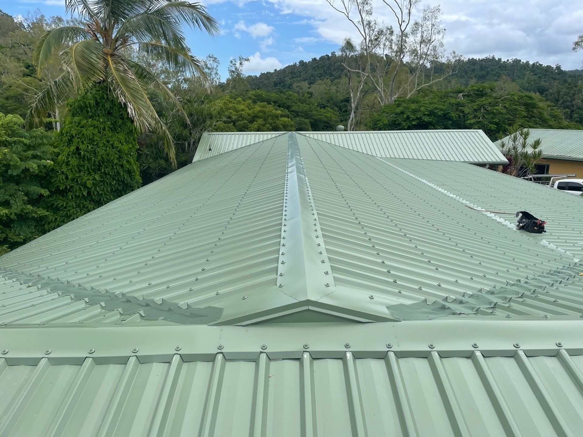 Red Colored Metal Roof — Roofing Services in Airlie Beach, QLD