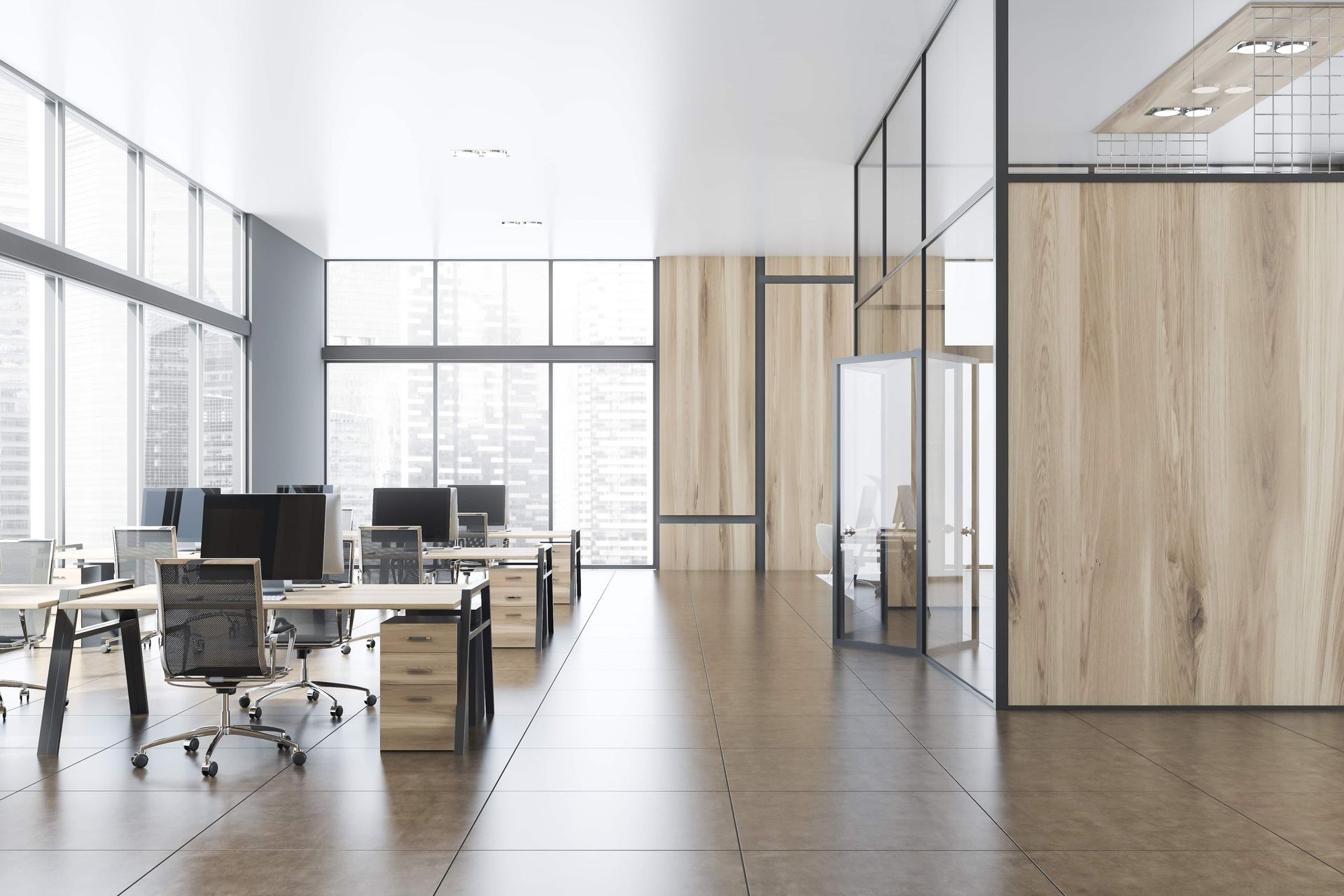 An empty office with a lot of windows and wooden walls.