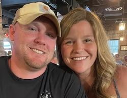 Woman Checking The Car — Owensboro, KY — Ohio Valley Automotive