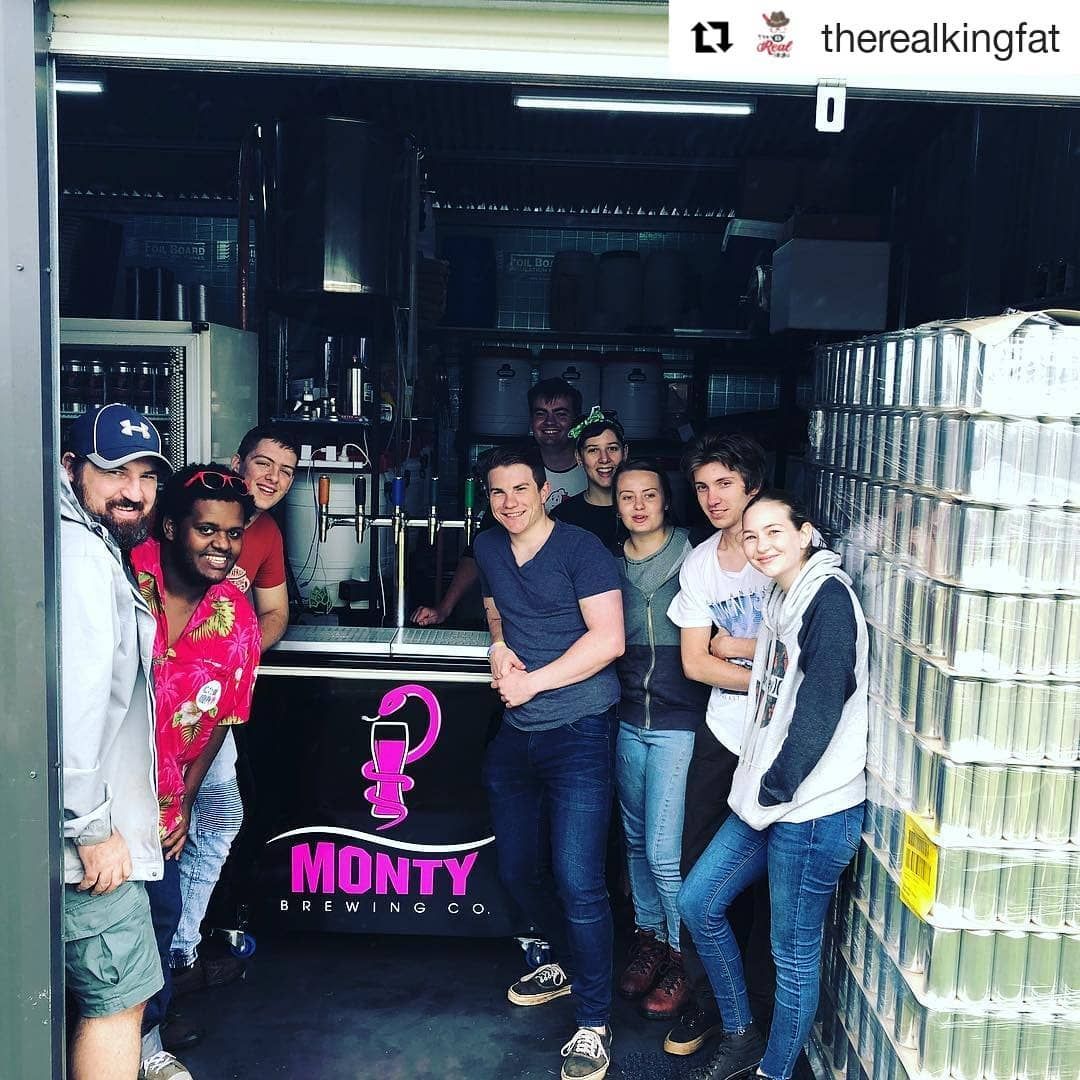 A Group of People Standing in Front of a Sign That Says Monty Brewing Co. — Monty Brewing Co In Highfields, QLD