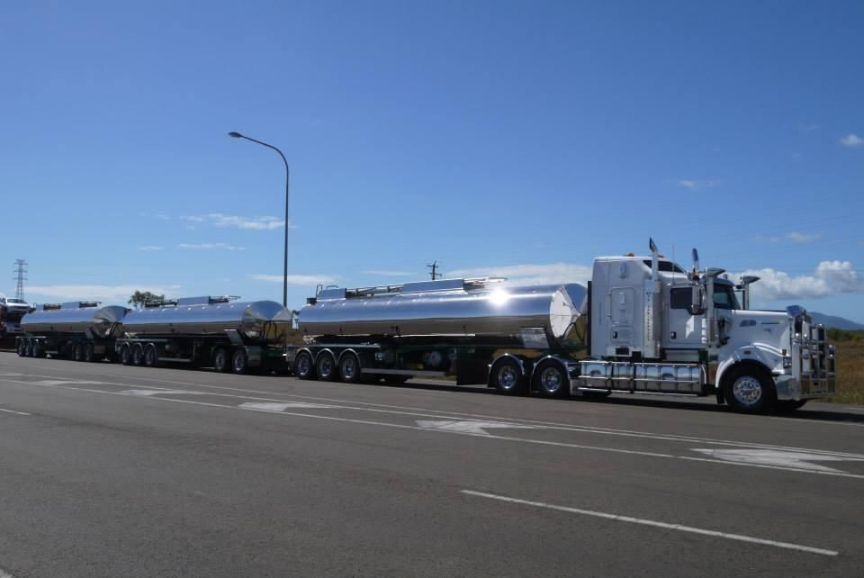 A Large Silver Semi Truck Is Parked On The Side Of The Road — Willow's Bitumen Haulage Pty Ltd In Stuart, QLD