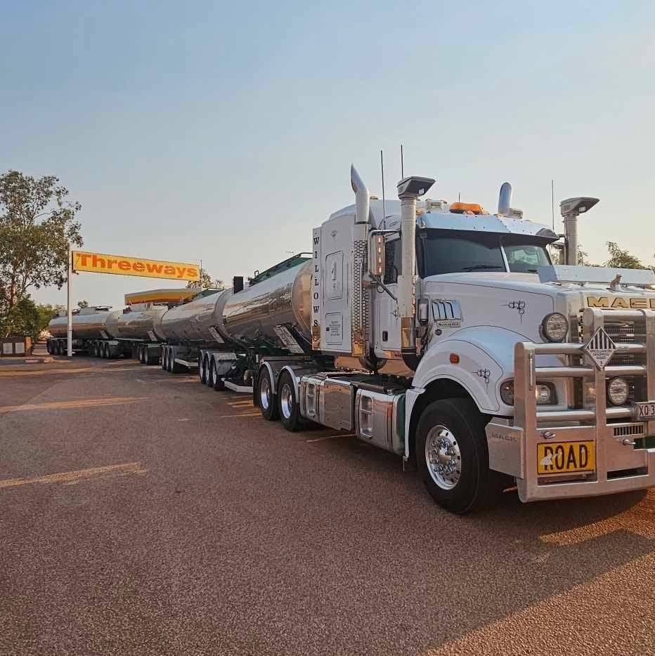 A Large Semi Truck Is Parked On The Side Of The Road — Willow's Bitumen Haulage Pty Ltd In Stuart, QLD