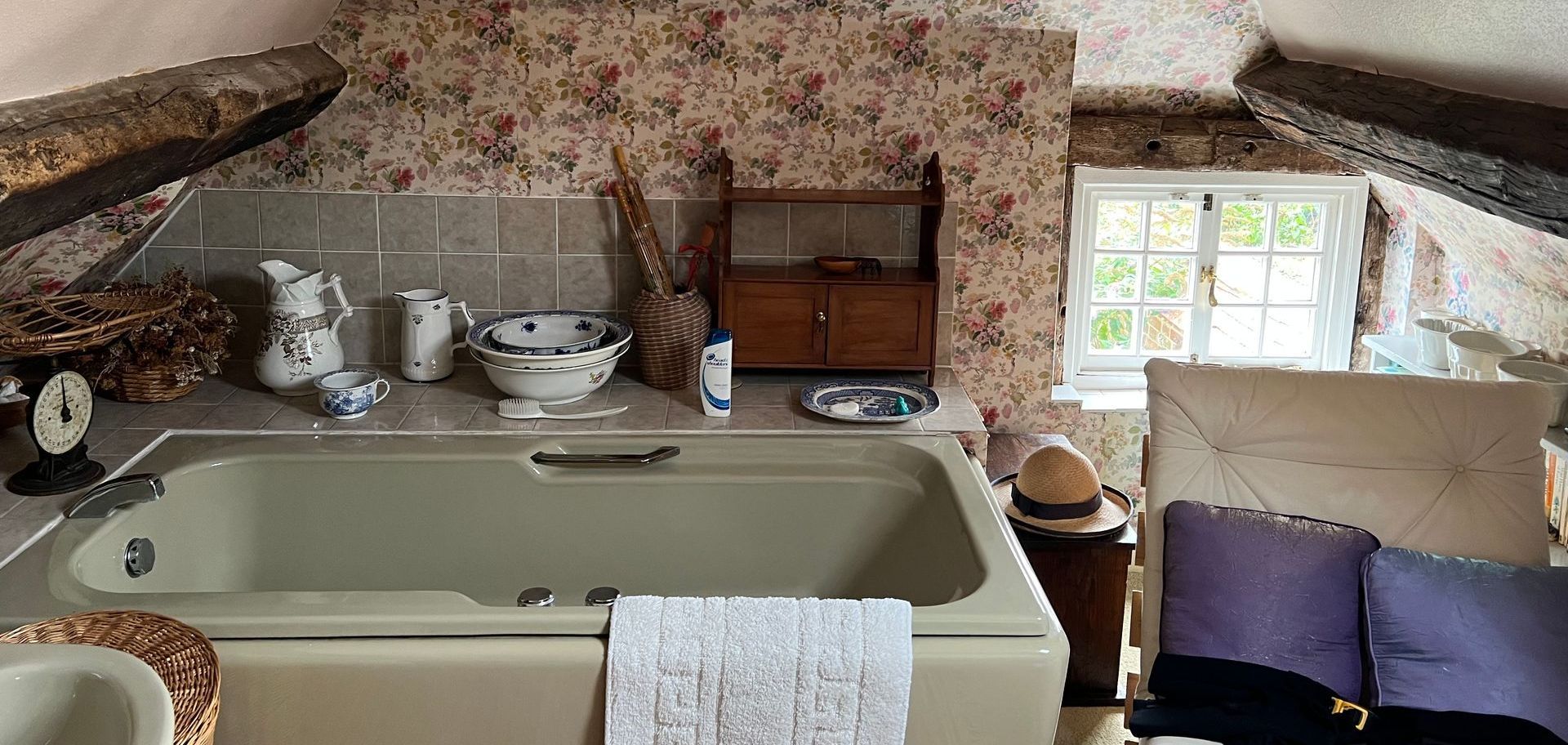 There is a bathtub in the middle of the room.