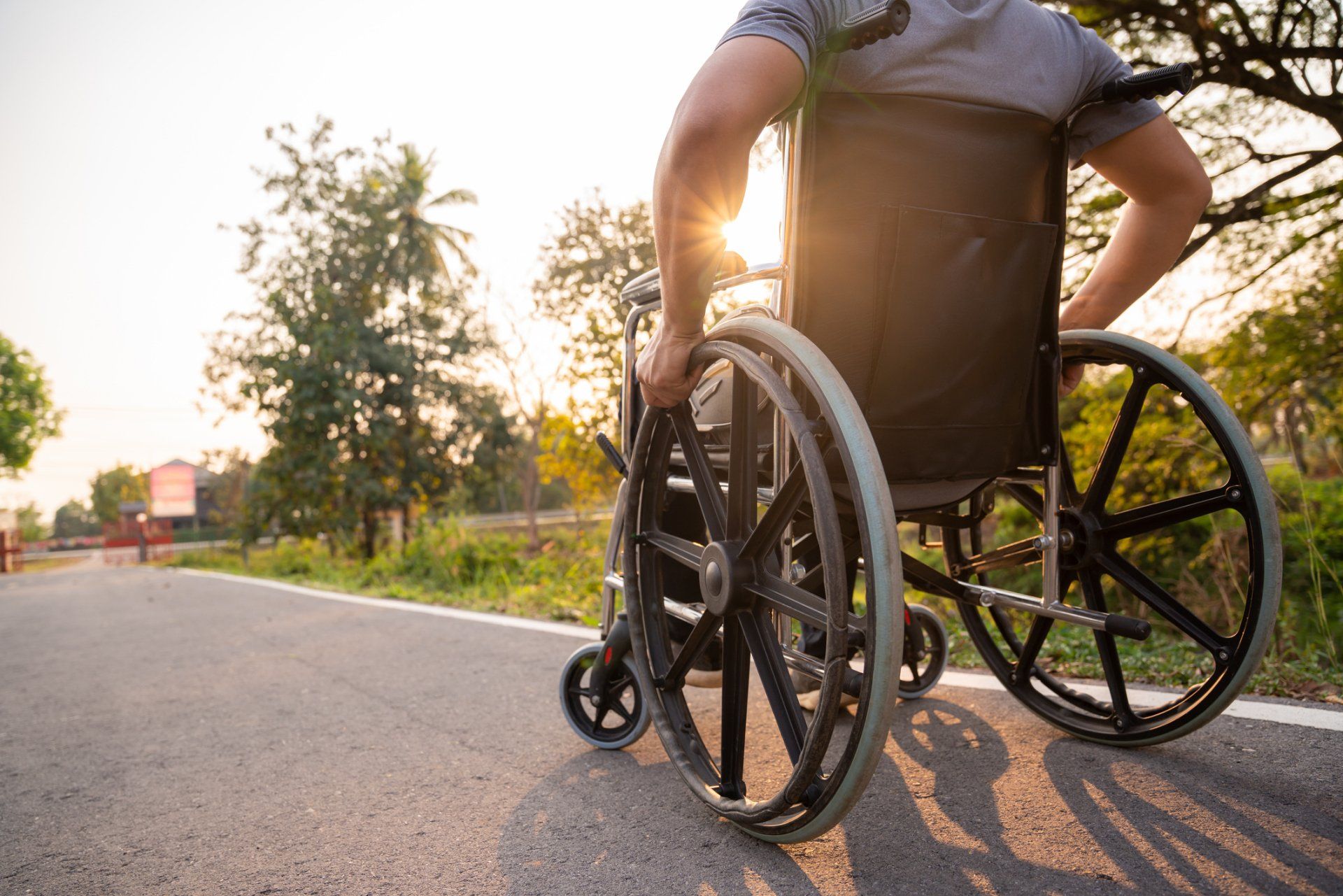 Man on a Wheelchair — Miramar, FL — Angelet’s Non-Emergency Wheelchair Transport