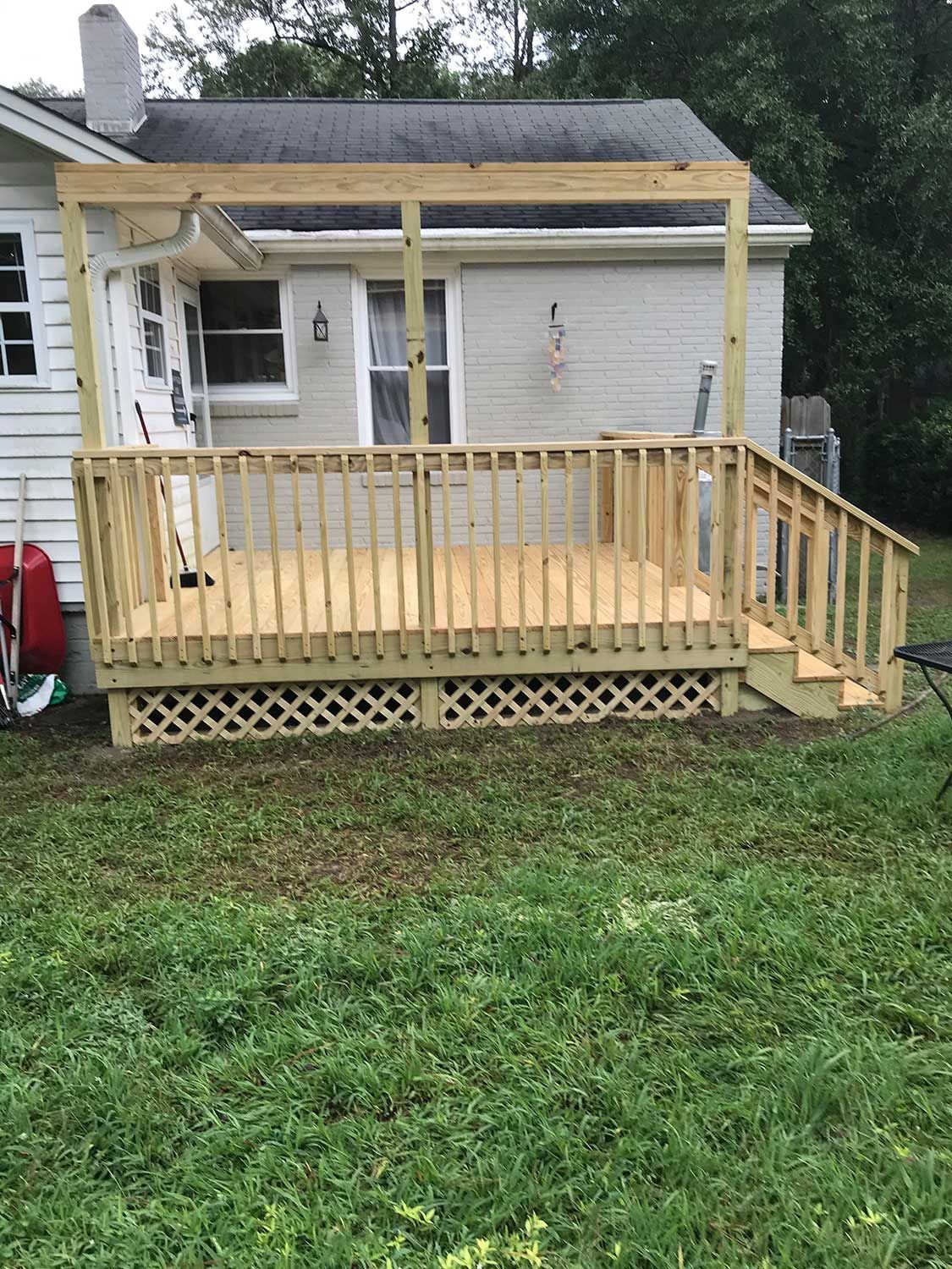 Home with Small Wooden Deck Home with Small Wooden Deck