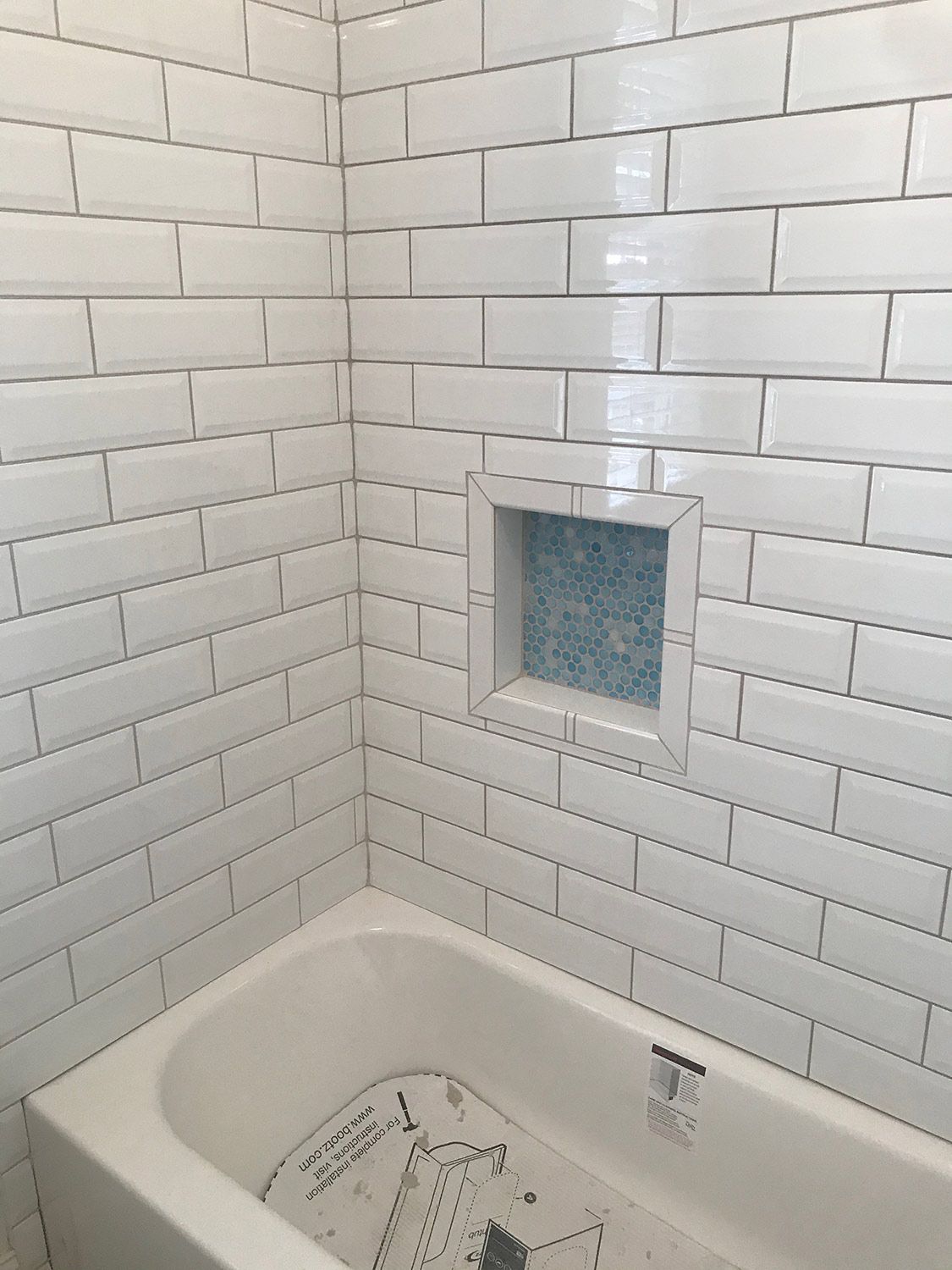 Installed Tiled Walls of a Bathroom