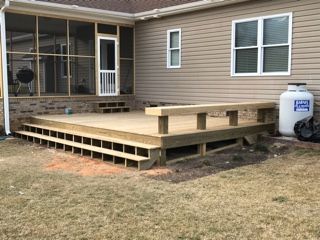 Wooden Deck Constructed in Backyard