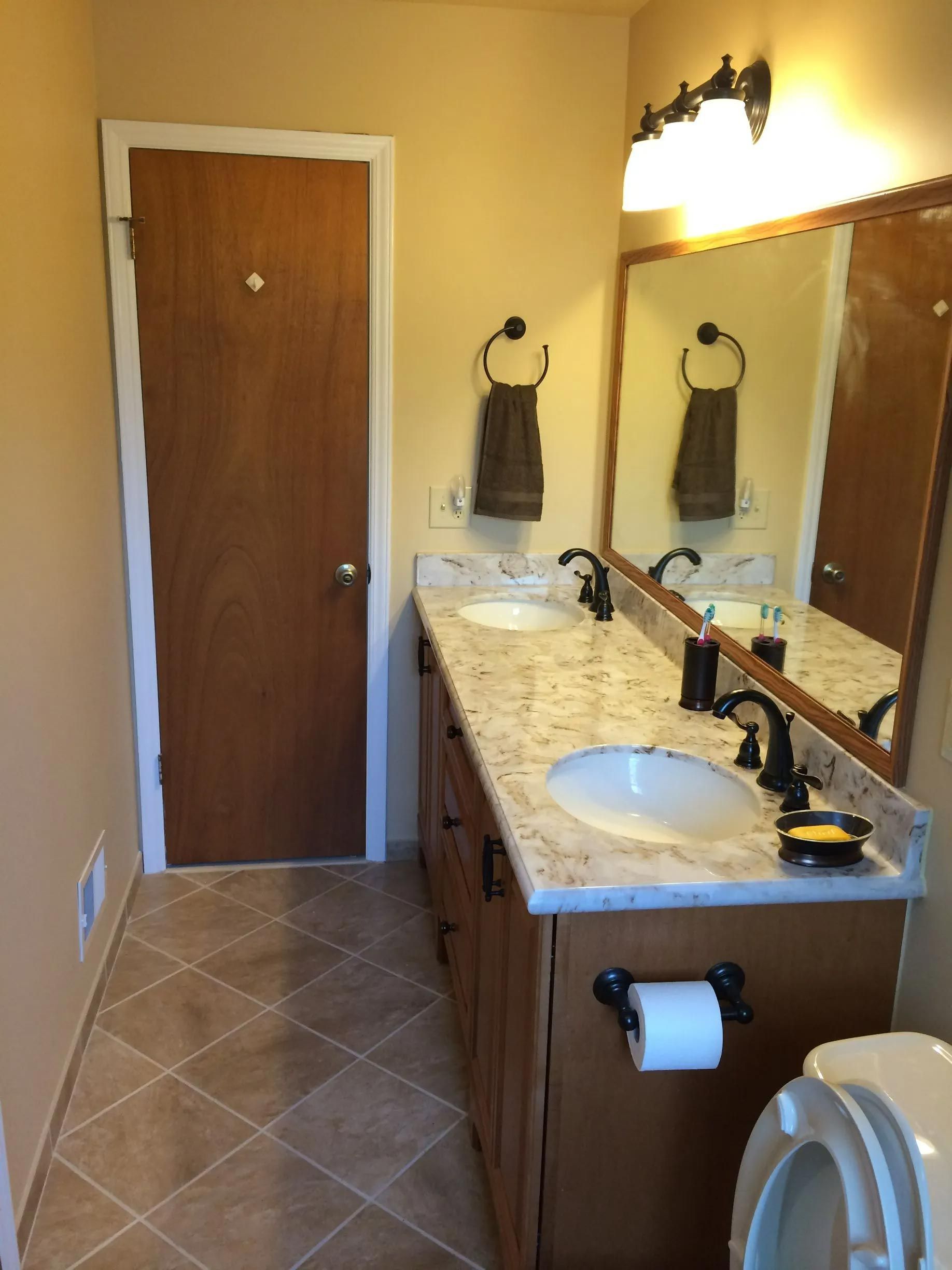 Minimal Space of Bathroom with Tile Flooring