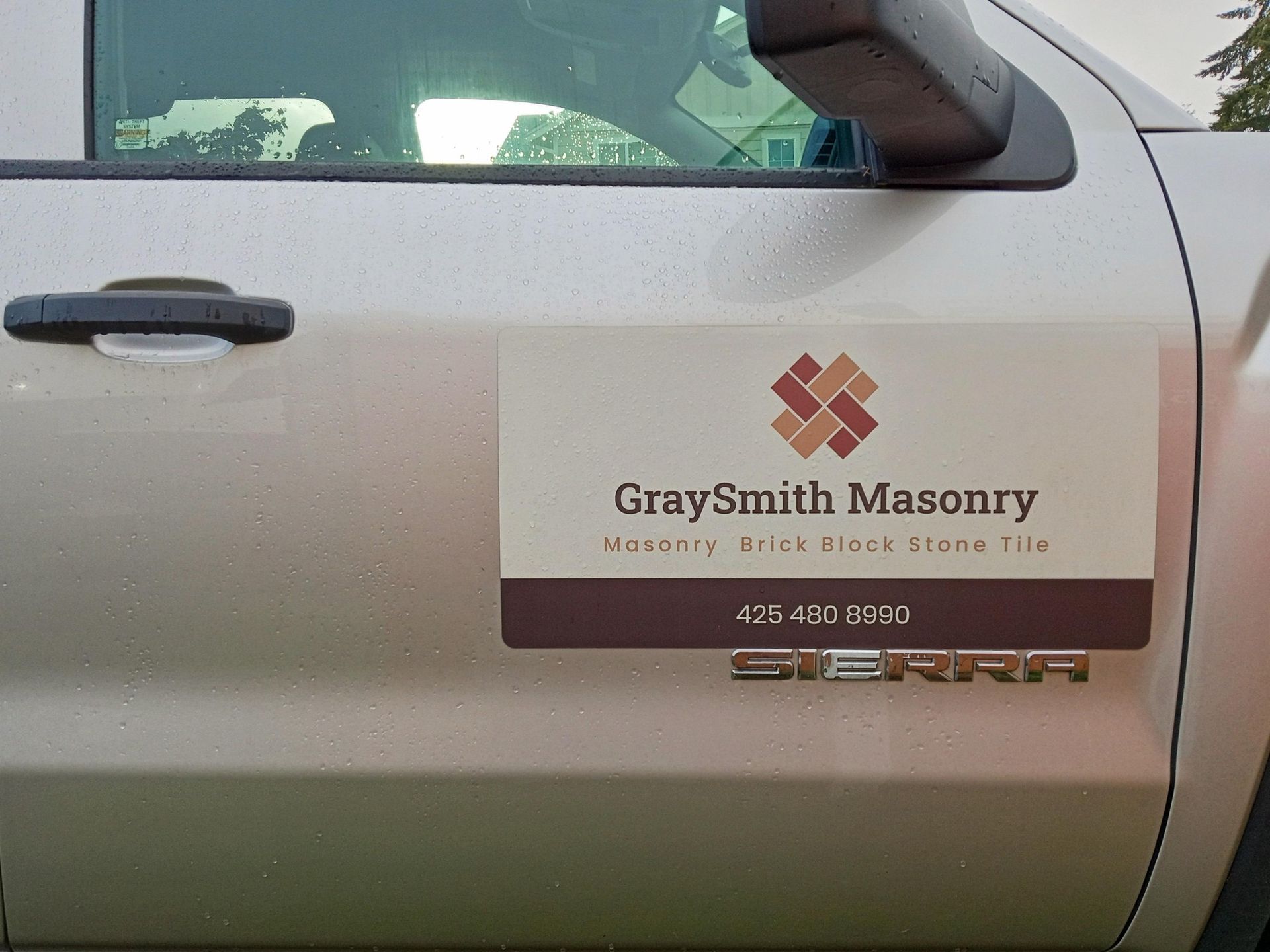 Graysmith masonry is advertised on the side of this truck
