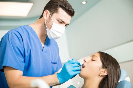 Dentist with patient