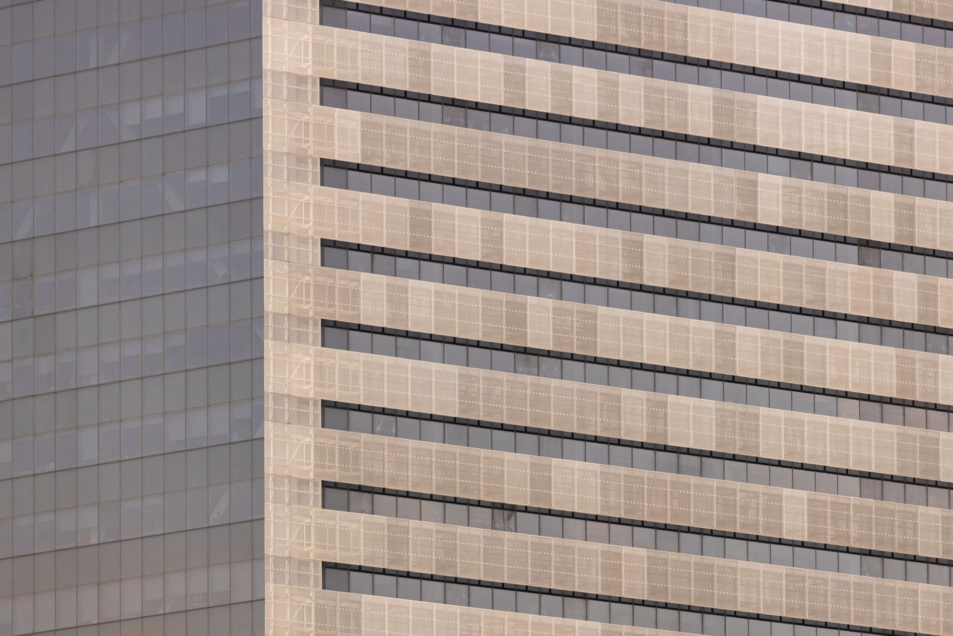 A close up of a tall building with a lot of windows