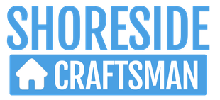 The logo for shoreside craftsman is blue and white.