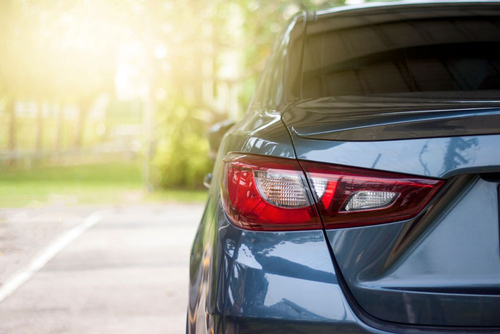 Rear View Of Blue Car — Cairns Traffic Lawyers In Cairns City, QLD
