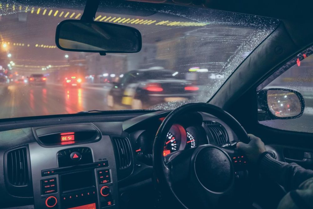 Person Driving Car Fast In The Rain - Cairns Traffic Lawyers In Cairns City, QLD