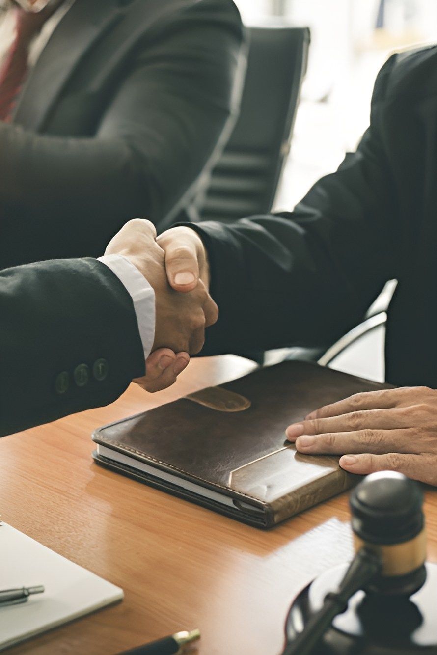 Two Lawyers Shaking Hands - Cairns Traffic Lawyers, Cairns QLD