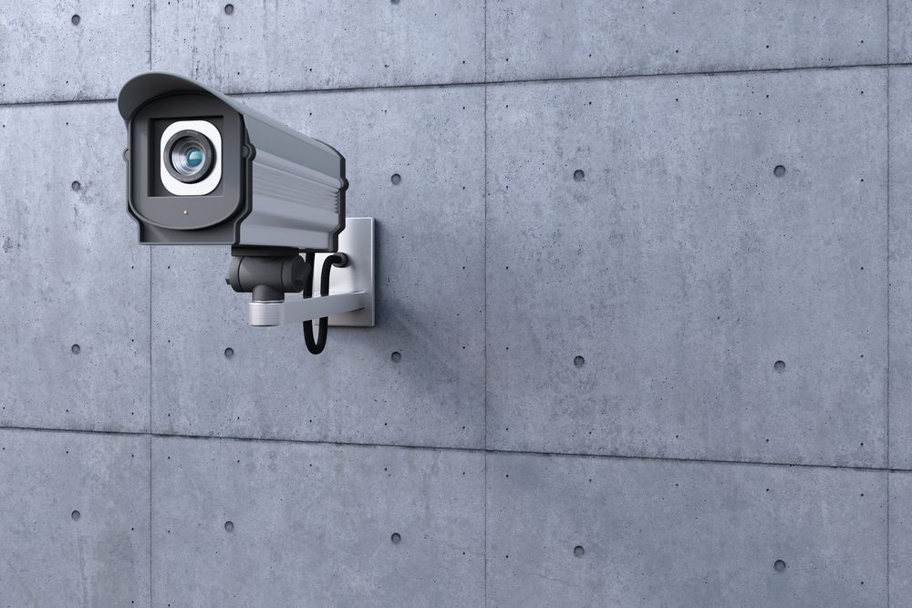 A Security Camera Is Mounted To A Concrete Wall — Joytech In Ciccone, NT