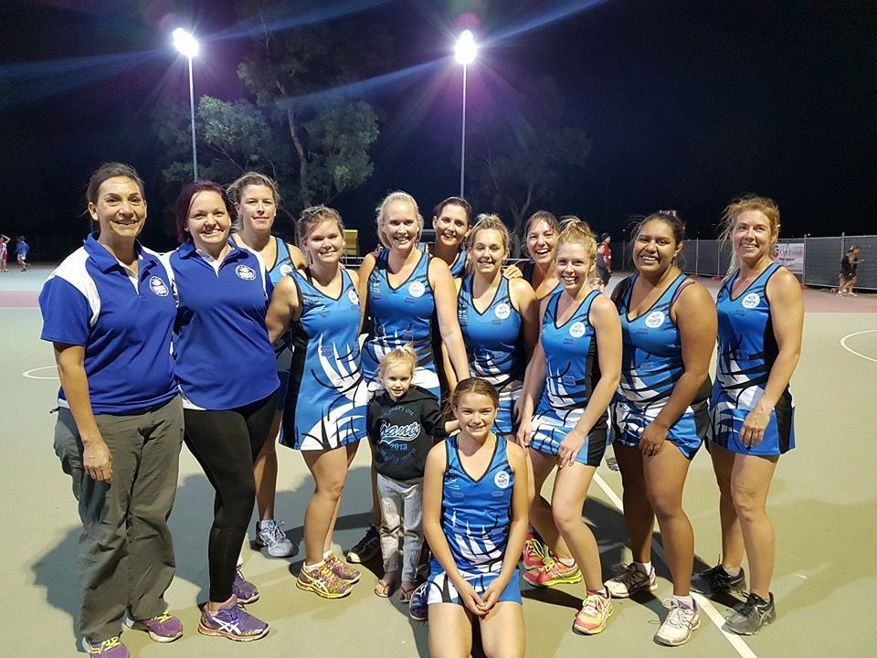 A Group Of Women Are Posing For A Picture On A Basketball Court — Joytech In Ciccone, NT