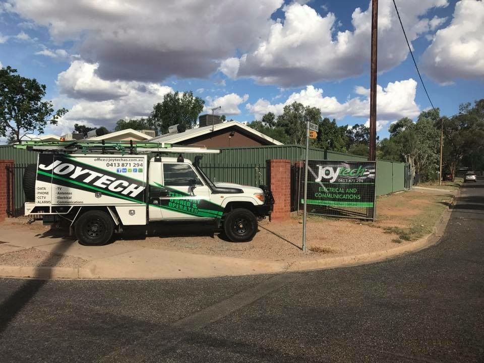 A Joytech Truck Is Parked On The Side Of The Road — Joytech In Ciccone, NT