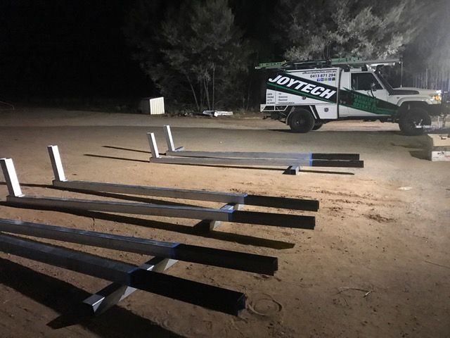 A Joytech Truck Is Parked On The Side Of The Road At Night — Joytech In Ciccone, NT