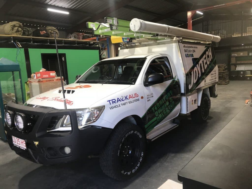 A White Truck is Parked in a Warehouse — Joytech In Adelaide, SA