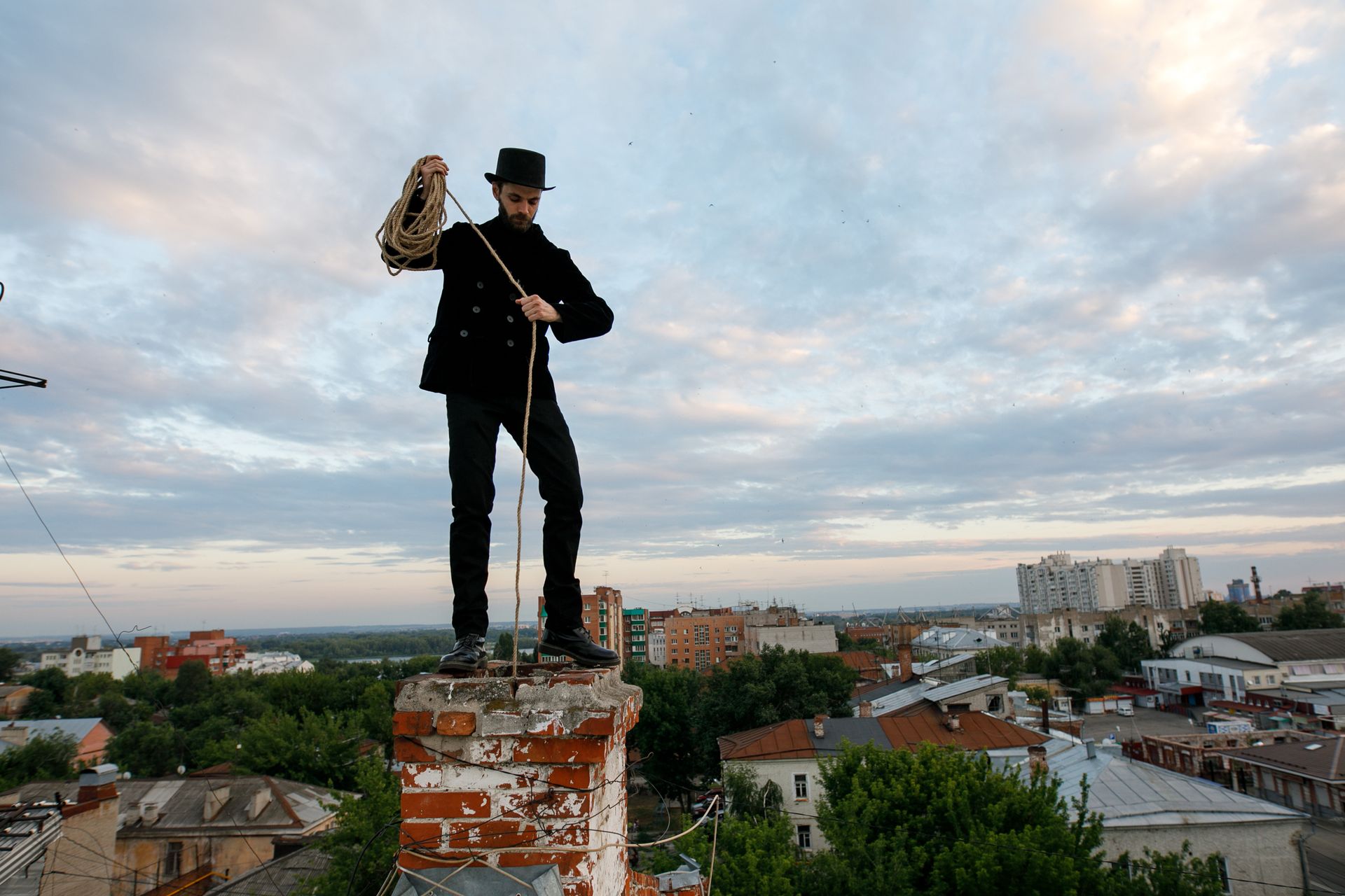Man Cleaning Chimney