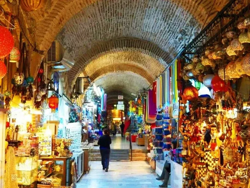 Kemeraltı Bazaar, a bustling street market in Izmir, with colorful goods on display.