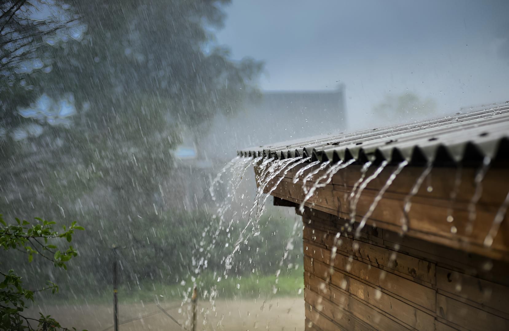 Rain is Falling From the Roof of a Building — Above All Roof Painters & Repairs in Narangba, QLD