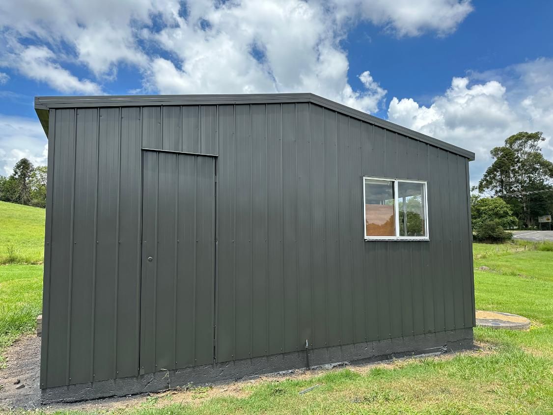 Black Shed With Two Windows — Above All Roof Painters & Repairs in Redcliffe, QLD