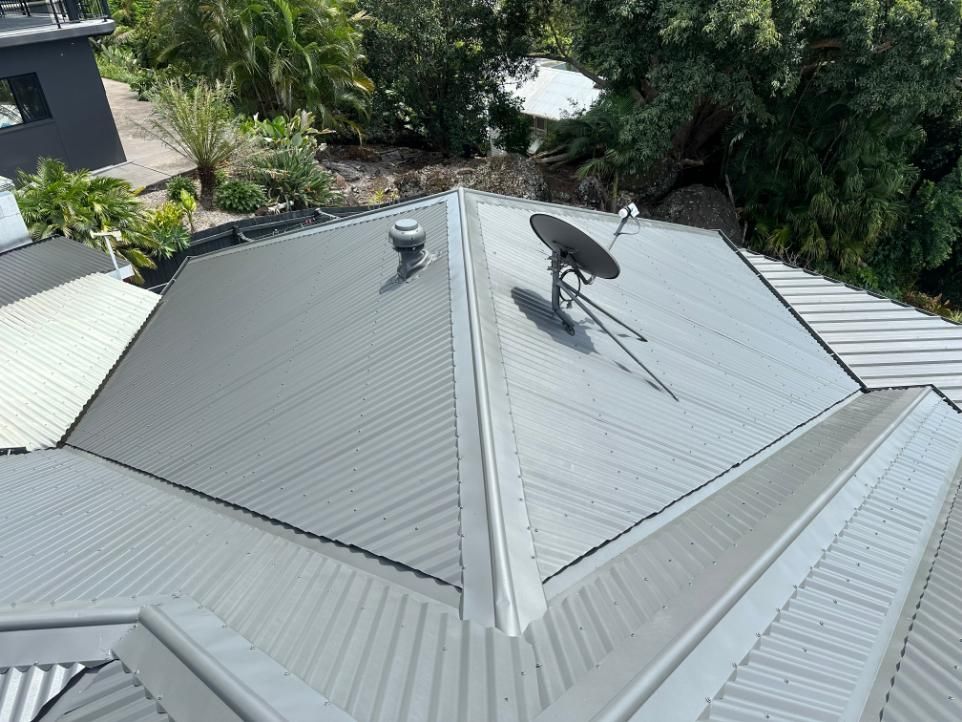 Roof With a Satellite Dish on Top of It — Above All Roof Painters & Repairs in Bellmere, QLD