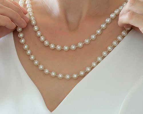 Jewelry Services — Woman Wearing Pearl Necklace in Houston, TX