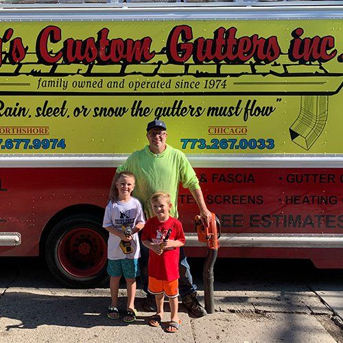 Owner And His Children — Gutter Installation in Skokie, IL Owner And His Children — Gutter Installation in Skokie, IL