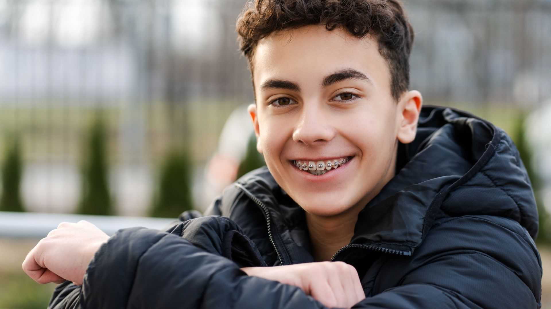 Teen smiling showing braces in Mayfield Ohio