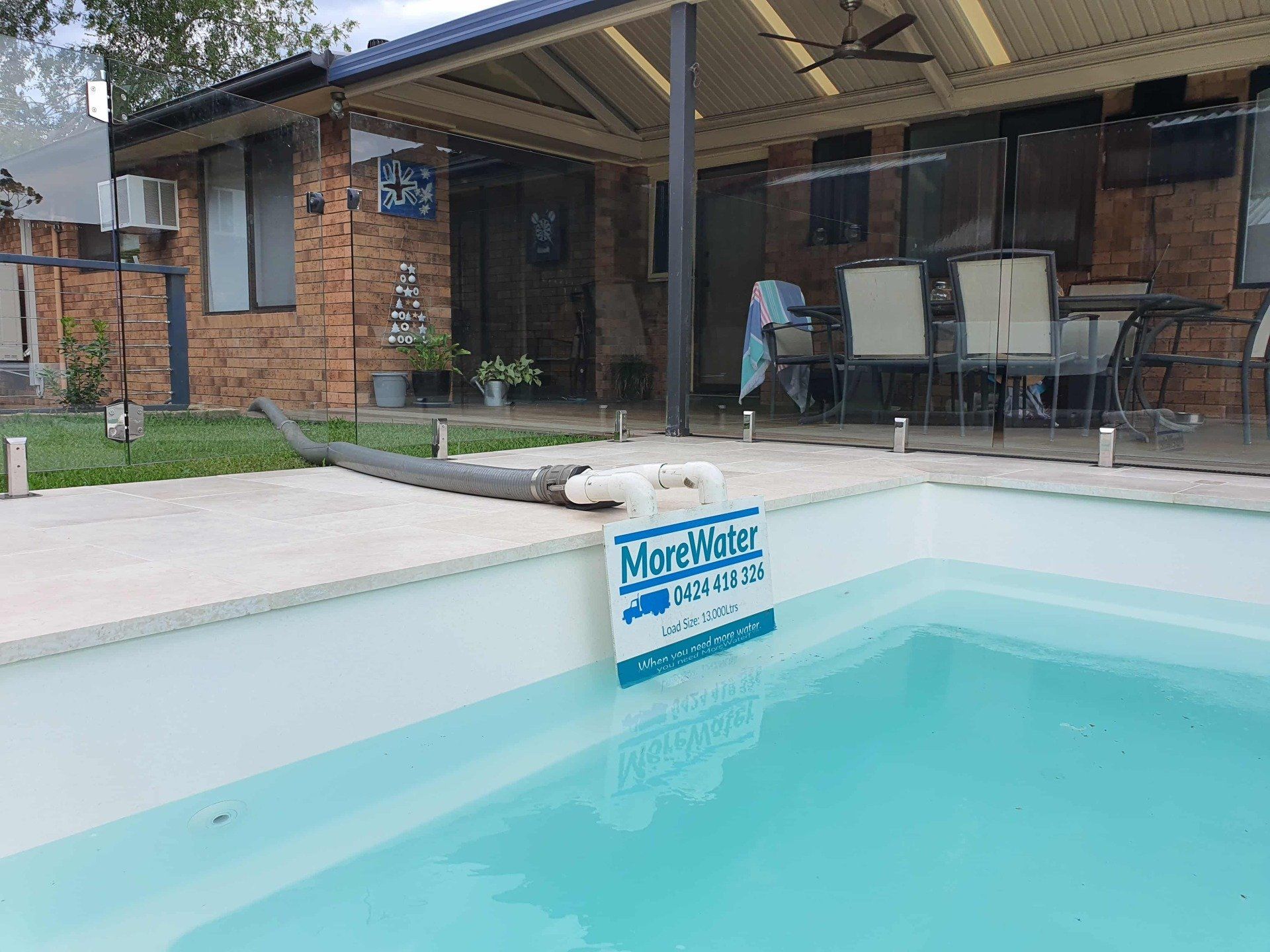 Swimming Pool Getting Filled