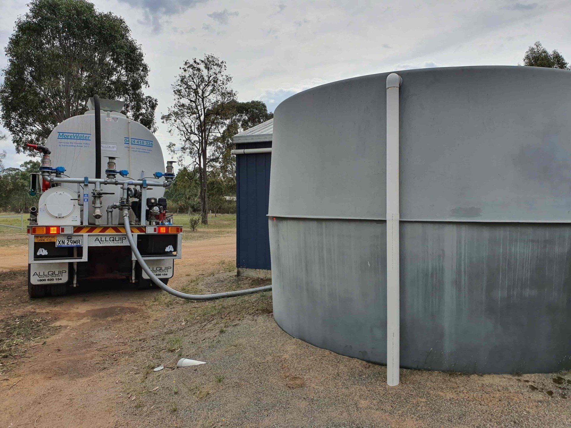 Water Truck Filling Up Water Tank