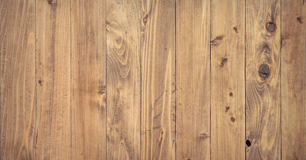 A close up of a wooden surface with a grainy texture.