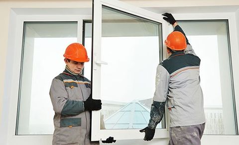 Workers Installing WIndow - Glass Installation in Bozeman, MT