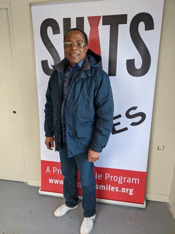 Man before suit donation