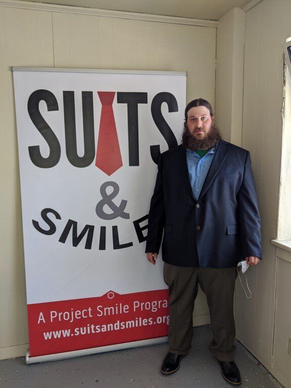 Man after suit donation