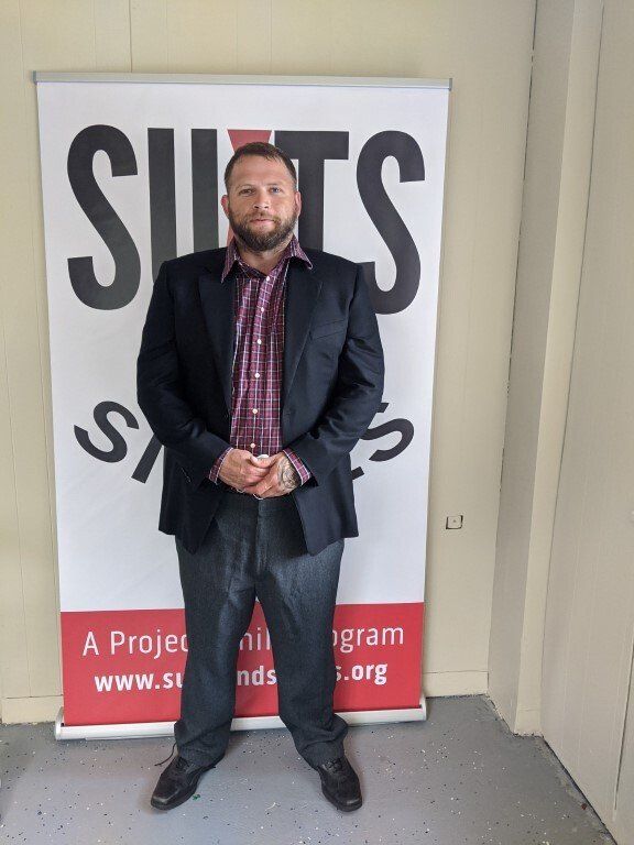 Man after suit donation