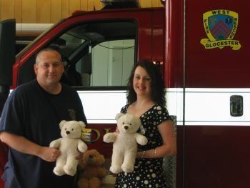 Glocester Fireman with Project Smile Children's Donations