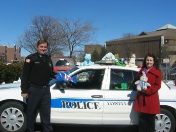 Lowell Police with Project Smile Children's Donations