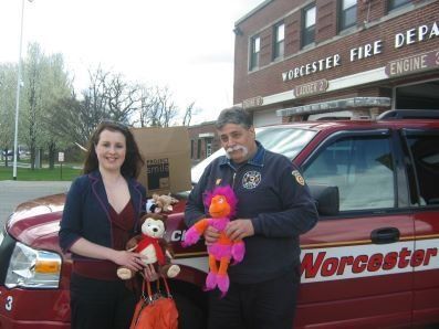 Worcester Fireman with Project Smile Children's Donations