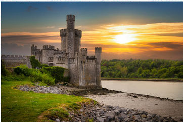 Model house with a red roof, white walls, green shutters, and a chimney.