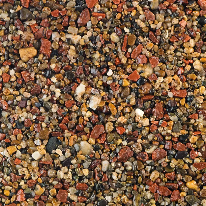 Close-up view of mixed gravel aggregate, various colors: red, brown, tan, and gray.